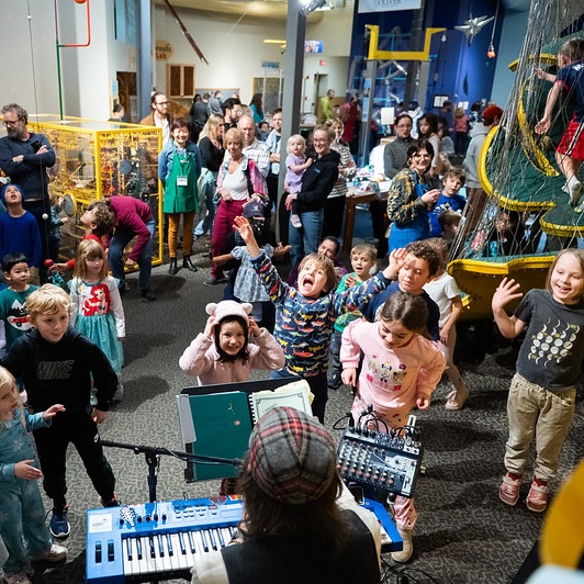 Kids dancing at WonderLab’s early New Year’s Eve Party in Bloomington